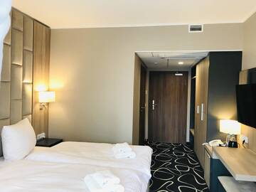Фото номера Двухместный номер Делюкс с 1 кроватью и балконом Отель Trofana Wellness &amp; SPA г. Мендзыздрое 4